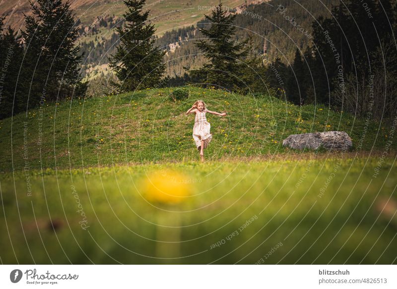 Happy girl in mountain summer glad free time mountains Easygoing Outdoors Cheerful pleasure Joy Girl during the day fun Summer Child Running Jump