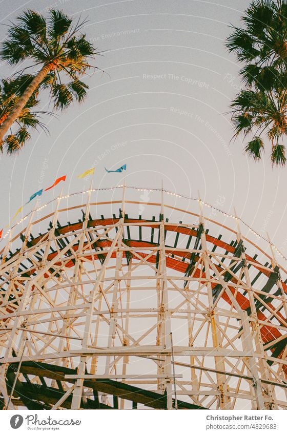 Drive me wild. Rollercoaster on 35mm Film. San Diego, California. Sunlight Filmlook Tourism Landmark Twilight Light warm Tourist Sky Copy Space vacation