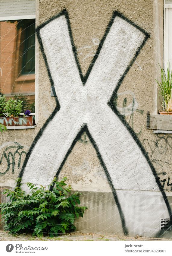 very big X sprayed on the wall of the house Characters Spray Detail Neutral Background Gray Digits and numbers Symbols and metaphors Sign Wall (building) Facade