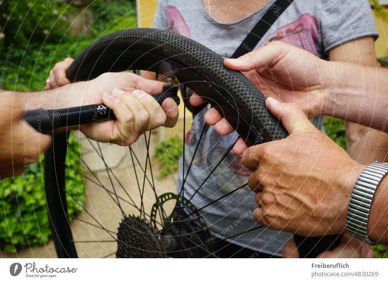 Inflate bike tires Air pump Spokes bicycle spokes Bicycle tyre hands Tire Wheel rim