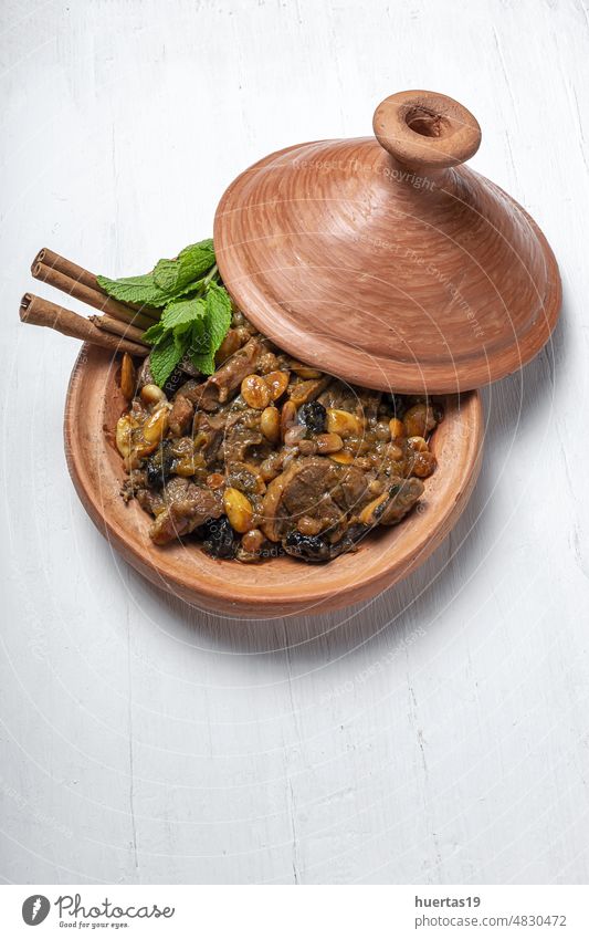 Traditional moroccan lamb meat tagine from above background food white spices stew Moroccan meat lamb Arabic food aid Muslim halal tajine arabic morocco