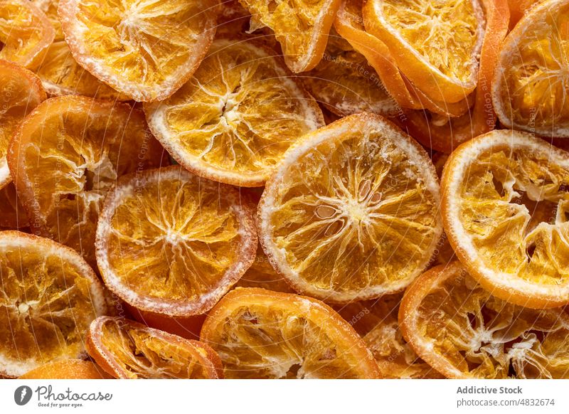 Close-up view of dried orange dry slices background isolated food dehydrated citrus fruit natural healthy ingredient decoration aroma sweet spice closeup