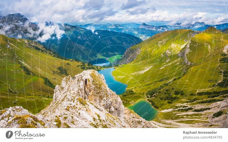 Panoramic view on three lakes (Vilsalpsee, Traualpsee, Lache) from Lachenspitze mountain above active adventure alp mountains alpine austria beautiful cliff