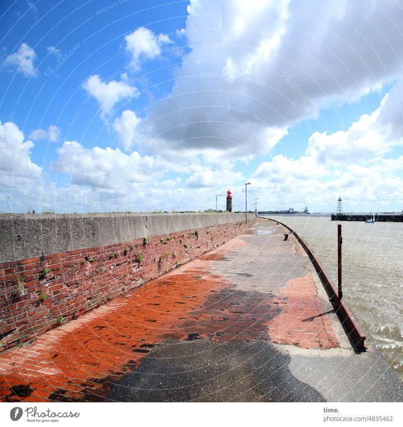 UrbanNature HB | counted pier wharf Mole Wall (barrier) quay wall Lighthouse Sky Water North Sea Brick Wet Damp Broken renovation case Horizon Clouds Boundary