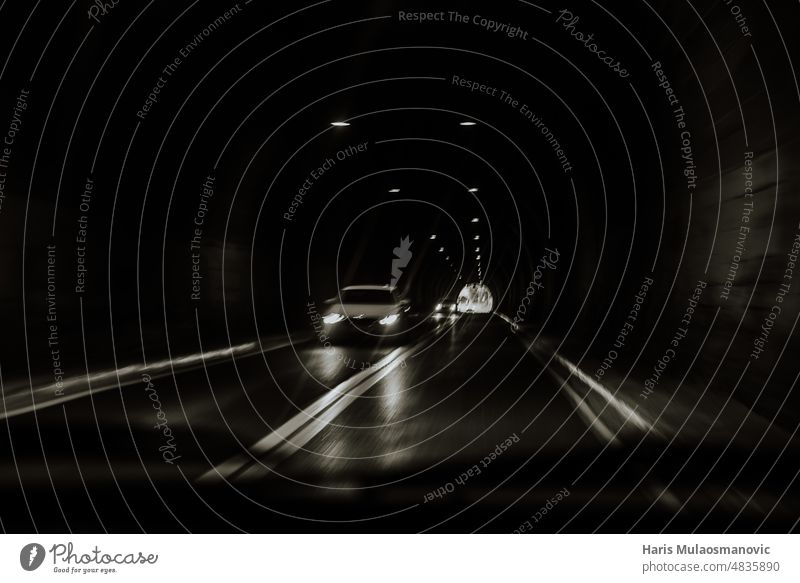 fast car in motion the tunnel black and white Motion blur Change moving car Tunnel Dark Vision Black & white photo travel Transport Night