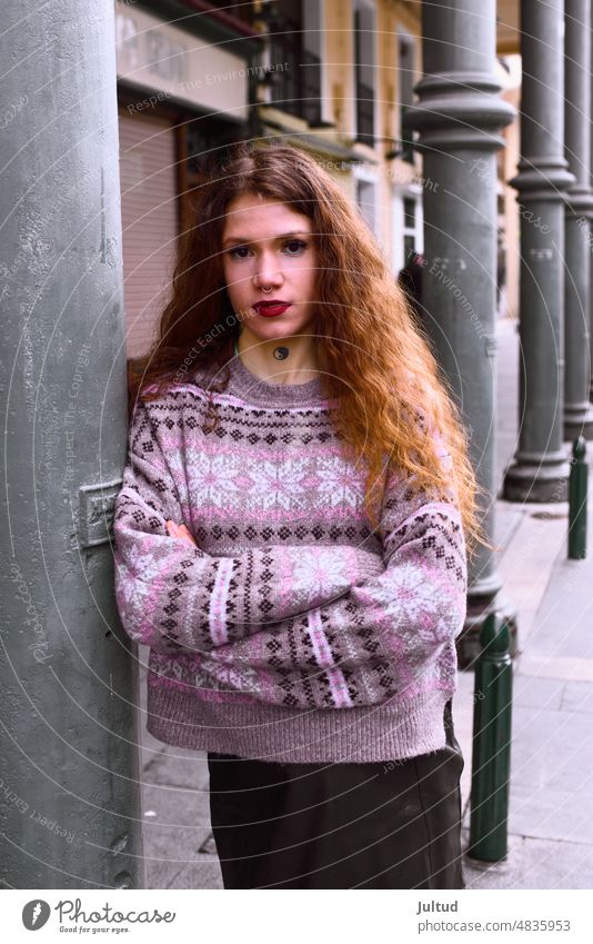 Portrait of young redhead girl in the city natural  Street   Urban   Woman  ginger curley City city life portrait  Alone   Casual   Caucasian  City   Girl 