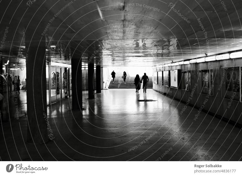 People in the underground passage backlight Black and white Light Shadow White Contrast Street Mysterious Tunnel Light in the tunnel Underpass