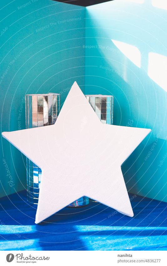 White star shape mockup with a cinematic atmosphere in blue tones background disco retro mirror vintage famous glamour film movie canvas frame white blank