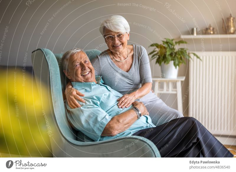 Happy senior couple at home senior adult older aged portrait person casual leisure lifestyle pensioner caucasian retired people mature retirement elderly