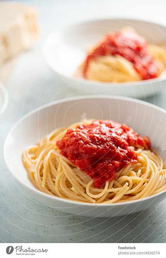 Spaghetti with tomato sauce and basil on a plate Classic Italy Tomato Sauce bowl cheese cooked cuisine culinary delicious diet dinner dish eat flavor food