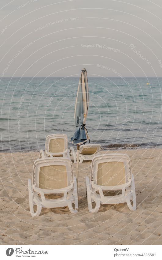 Empty beach chairs Beach Summer vacation Evening Blue Ocean Vacation & Travel Sand Deserted Tourism Beautiful weather coast Relaxation Sky Water Horizon Freedom