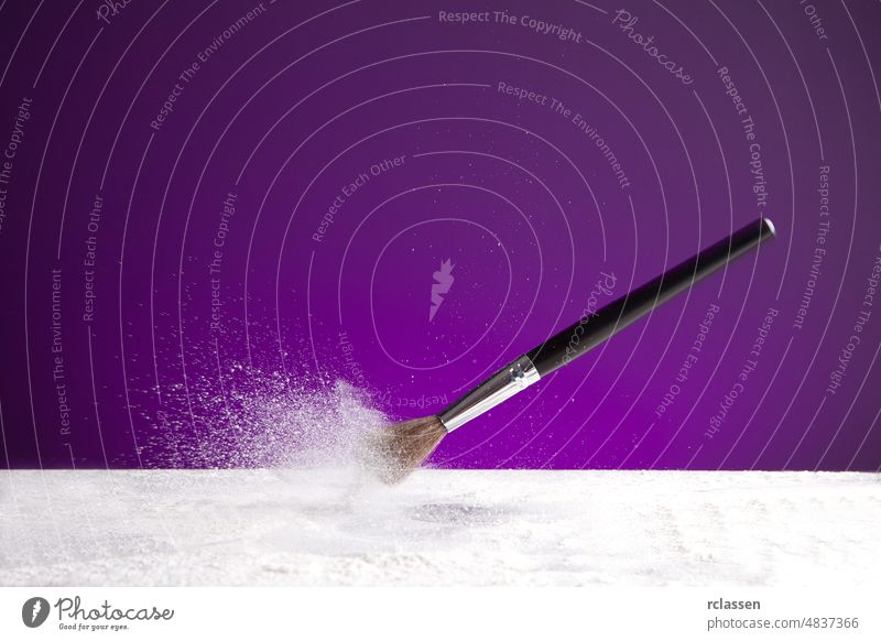 powderbrush on purple background dust float makeup manicure beauty care cheeks color color picture cosmetics drogerie dusty elegance eye eyes face fashion