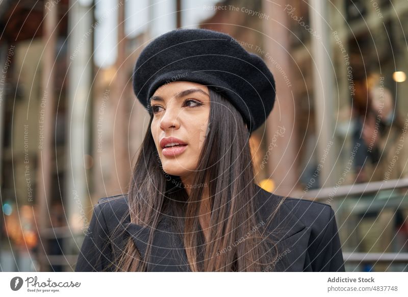 Charming woman in beret on street style city appearance fashion trendy feminine design thoughtful headwear attractive building lady charming attire town