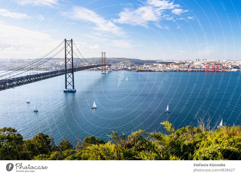 View of Ponte 25 de Abril and Lisbon Tourist Attraction Sightseeing City trip Capital city Architecture Colour photo Tourism Vacation & Travel Portugal travel