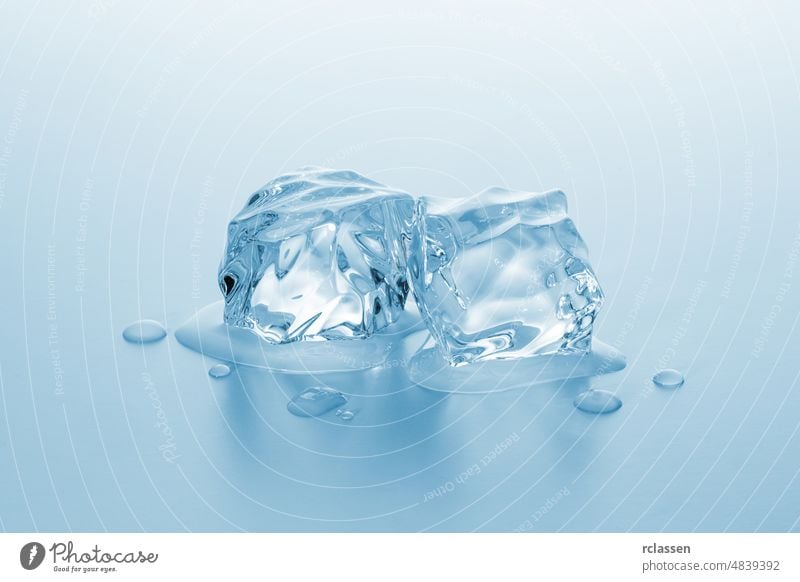Two cubes of ice frozen - a Royalty Free Stock Photo from Photocase