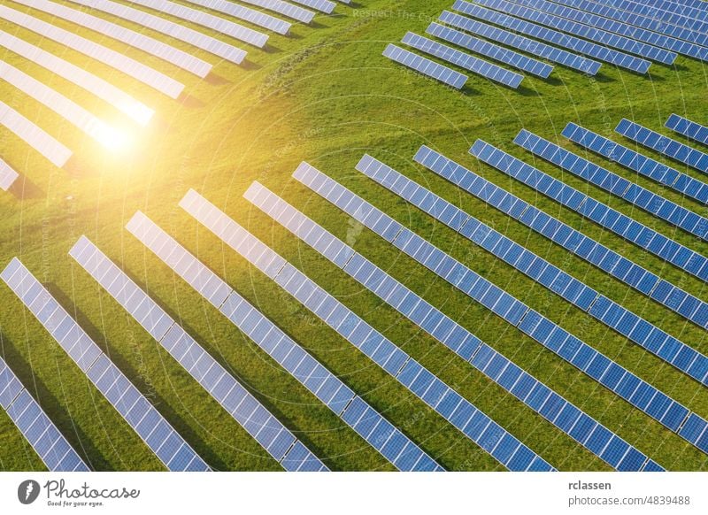 Droneshot of a Solar panel Farm green electricity produced solar farm field drone power sustainable environmental energy plant sun wind ecosystem industry
