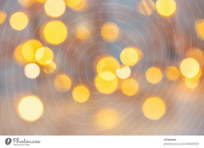 blurred bokeh of Christmas lights. Magic winter holiday abstract background christmas new year eve merry card advent glitter yellow lantern christmassy