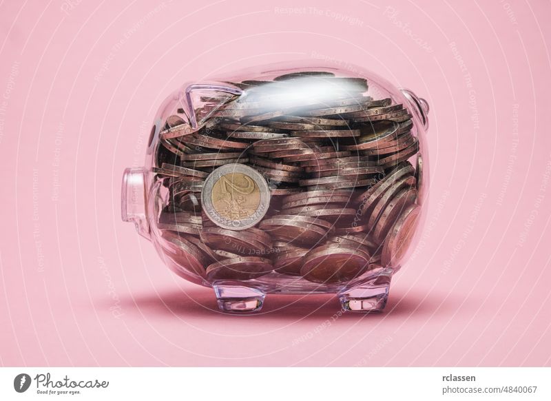 look inside a piggy bank with money coins transparent euro retirement budget tax future personal glass finance pension credit assets abundance accounting