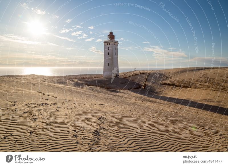 the silted lighthouse at sunset Rubjerg Knude Fyr Lighthouse Wanderdüne Rubjerg Knude Denmark Beach dune coast North Sea Tourist Attraction Vacation & Travel