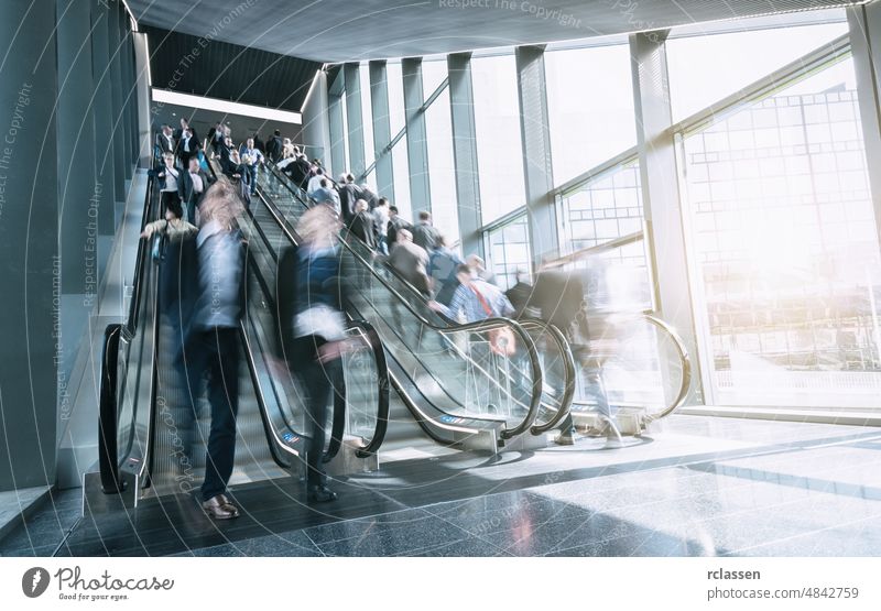blurred people at staircases european exhibition international abstract airport architecture business businessman cologne commuters concept conference congress