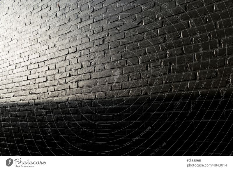 black painted brick wall with sunlight texture abstract aged architecture backdrop block brickwork built cement city clay color concrete construction design