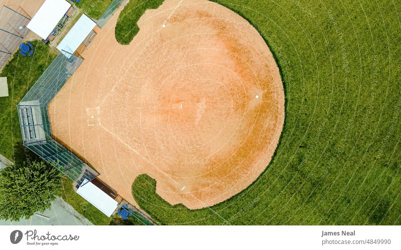 Springtime baseball diamonds at rural park grass pastime color american team background modern summer national wisconsin dirt arena outdoors white sports green