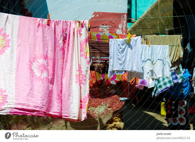a washing day in Mombasa Laundry Washing day Orderliness Dry Side by side clothesline Textiles Housekeeping Photos of everyday life Authentic Hang Cloth pattern