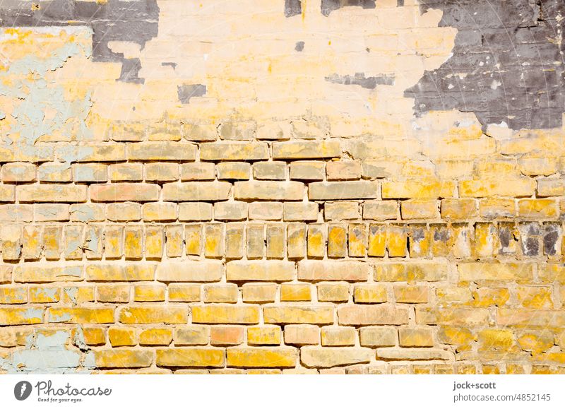 Brick wall has blemishes lost place Wall (barrier) Old Change Ravages of time Detail Structures and shapes Background picture Repaired Primed Simple Yellow