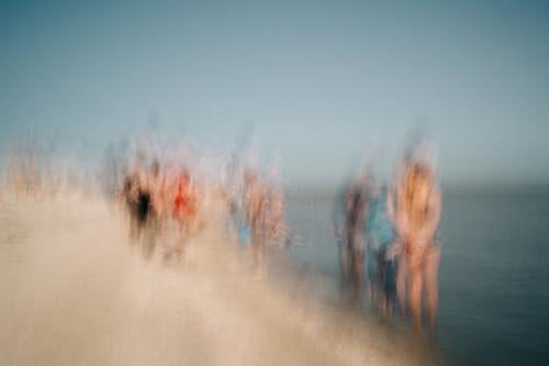 an anonymous, blurry crowd on the beach anonymity Beach people off Uncertain future vibrating Mysterious blurred depression Fear anxiety Ambiguous Loneliness