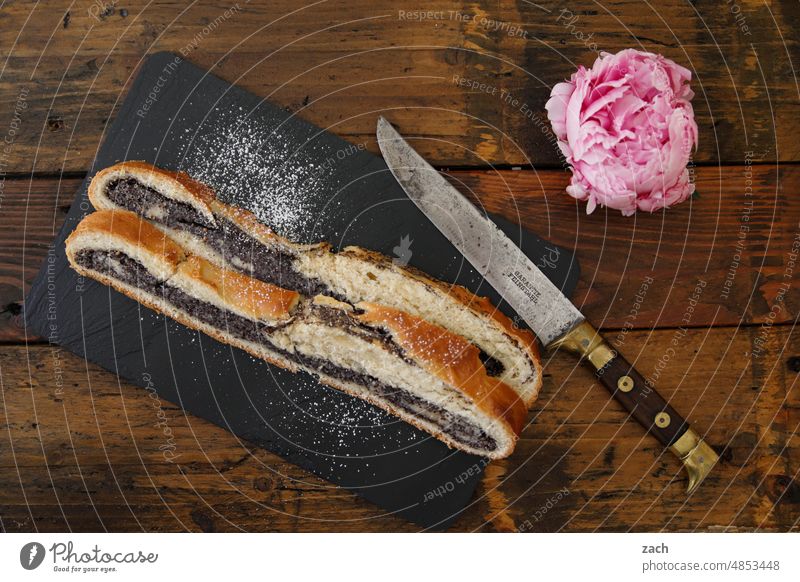 Taste explosions Cake Baked goods Food photograph Baking Confectioner`s sugar cute Delicious Blossom Flower Poppy poppy-seed cake poppy seed strudel Knives