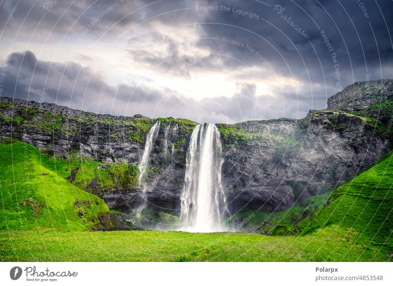 The beautiful Seljalandsfoss waterfall in Iceland icelandic nature long exposure blurred adventure environment volcanic famous island iceland landscape motion