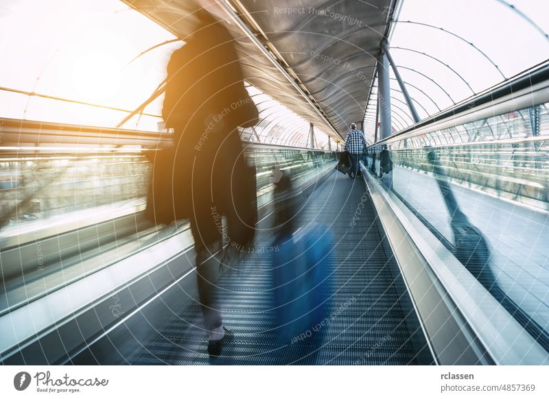business Commuters travel speed concept architecture visitors move corridor Frankfurt people trade fair group cologne munich blur germany messe exhibit hostess