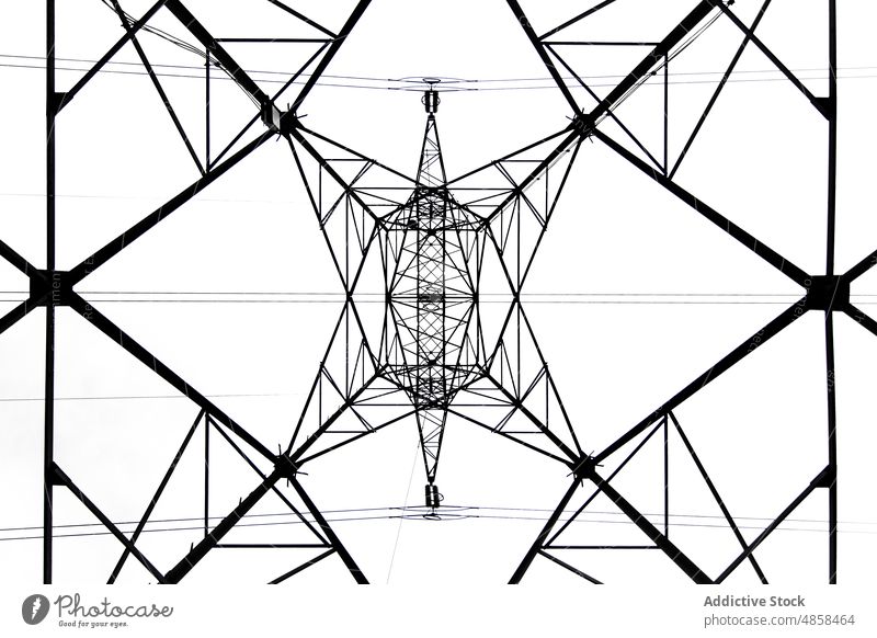 Energy tower creating abstract background geometric shapes geometry symmetry design metal construction electricity line production modern steel structure