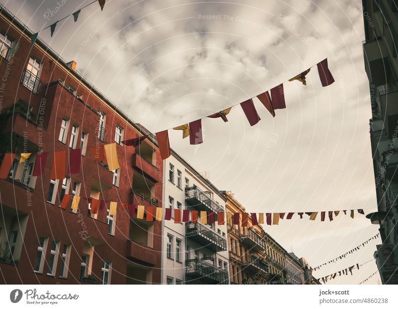 connected with colorful flags Decoration Street art Flag Tall Solidarity Joie de vivre (Vitality) Creativity Housefront neighbourhood Above Ease