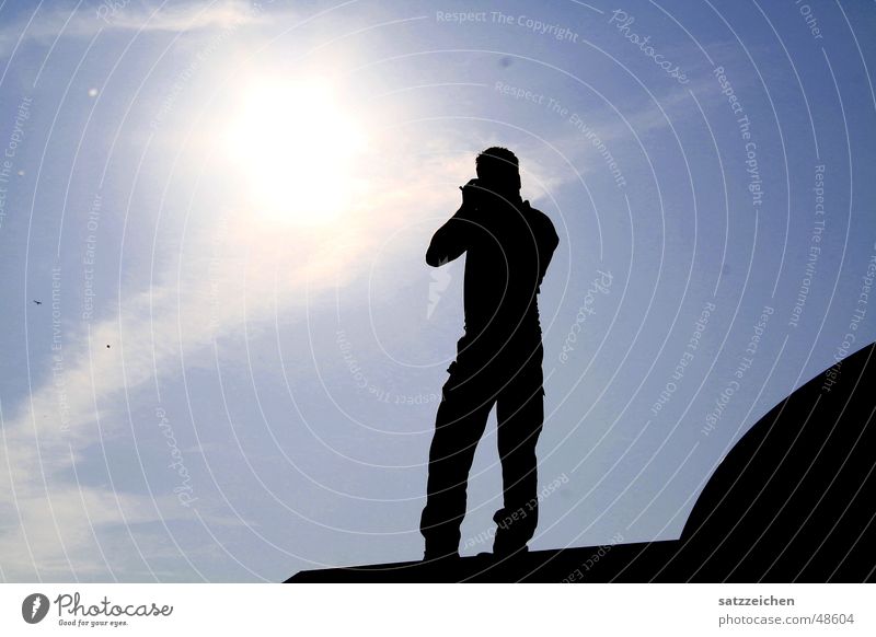 Photographer with sun in his heart Back-light Roof Clouds Infinity Man Flashy Light Sun sunshine Sky Focal point