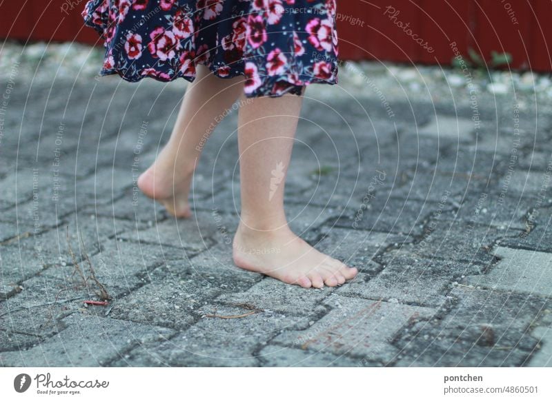 Bare children's legs and feet on cobblestones. Girls on the move in summer. Child Paving stone Movement Legs Dress Joie de vivre (Vitality) Playing Infancy