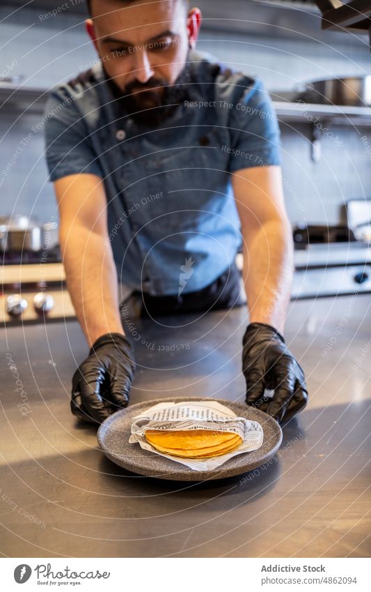 Chef Arranging Tortillas On Counter In Kitchen Plate Restaurant Cooking Flatbread Food Preparing Meal Fresh Standing Industrial Occupation Healthy Preparation