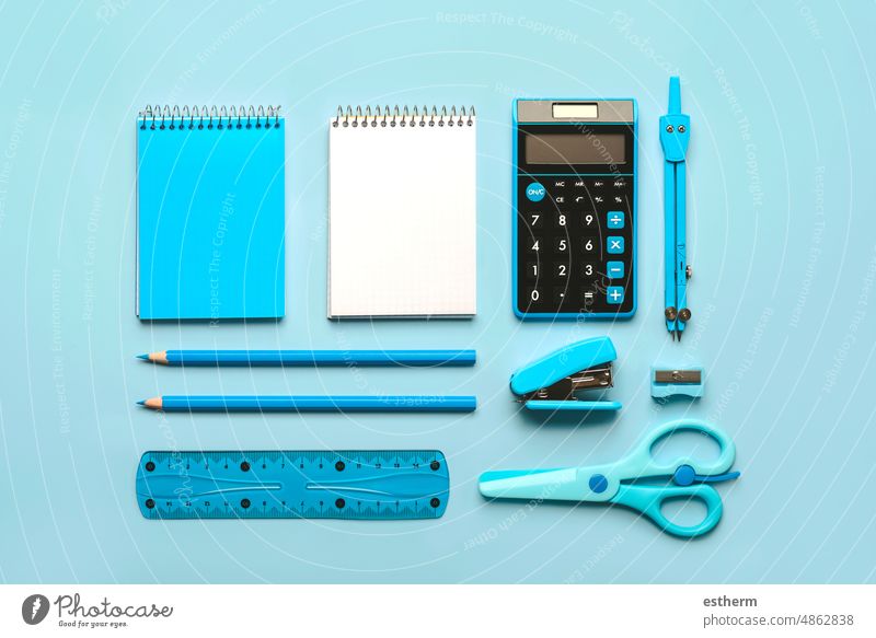 Top view of school supplies. Back to school concept education stationery back to school concept students notebooks calculator colors pencils colored textbook