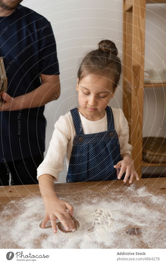 Father Looking At Daughter Draws On Flour On Table Holding Mixing Bowl Happy Playing Home Love Sieve Mixer Dough Family Food Ingredient Domestic Lifestyle
