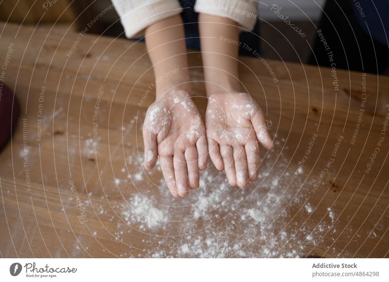 Top View Of Girl Showing Hands With Flour Countertop Making Home Covered Ingredient Messy Learn Palm Play Wooden Table Food Domestic Lifestyle Preparation