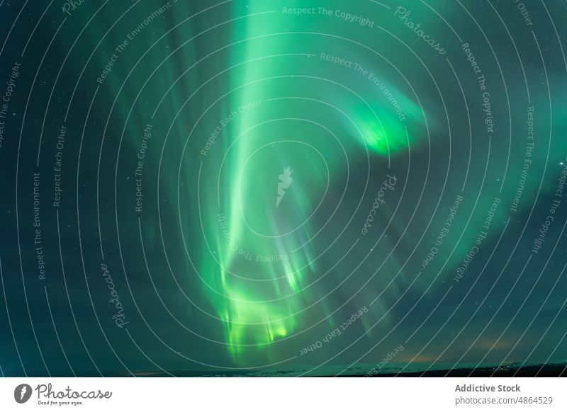 Amazing view of northern lights in night sky aurora borealis mountain winter polar glow illuminate phenomenon scenic picturesque dark spectacular green color