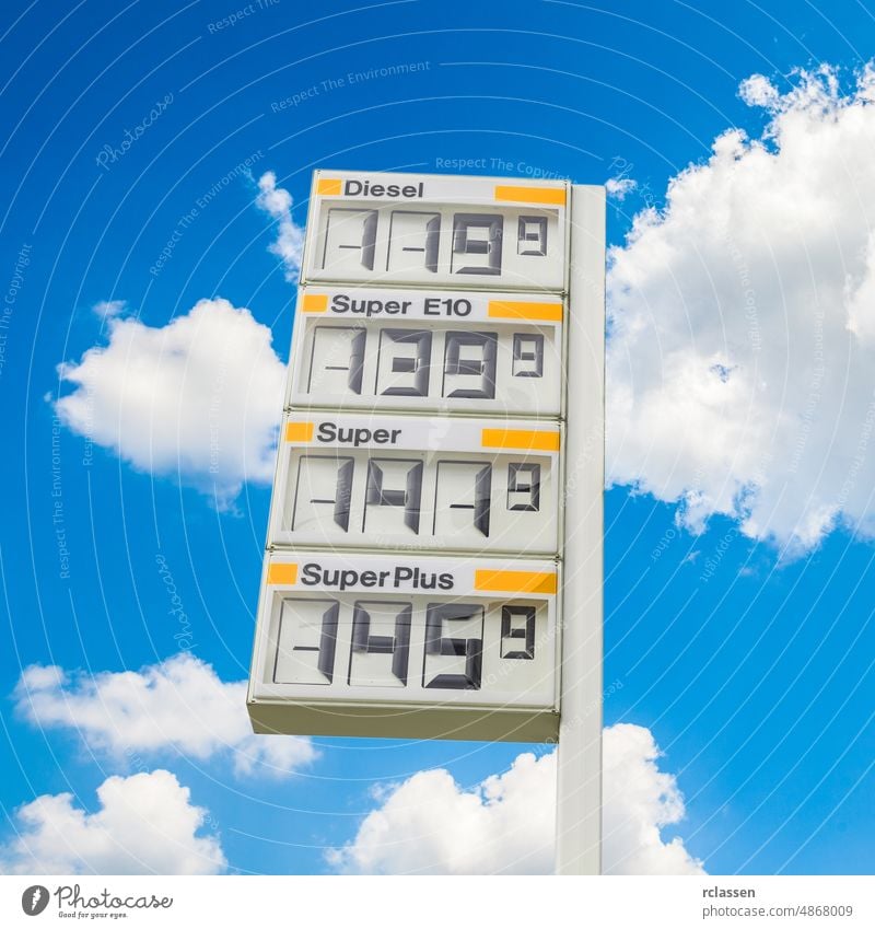 gas station scoreboard with prices fuel car tank filling gasoline oil petrol pump service economy petroleum energy refueling travel vehicle diesel transport