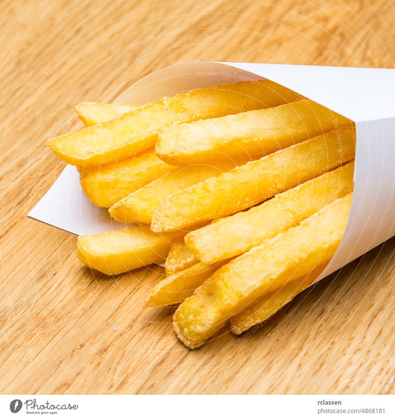 French fries potatos French bag frit portion Pommes Cornet Dutch snack German potato rod fries stand fritüre thick eat paper bag chips french bude to go