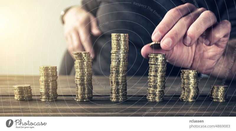 counting coins stack money investment business finance growth concept cash currency gold financial bank banking stacked economy savings pile dollar rich euro