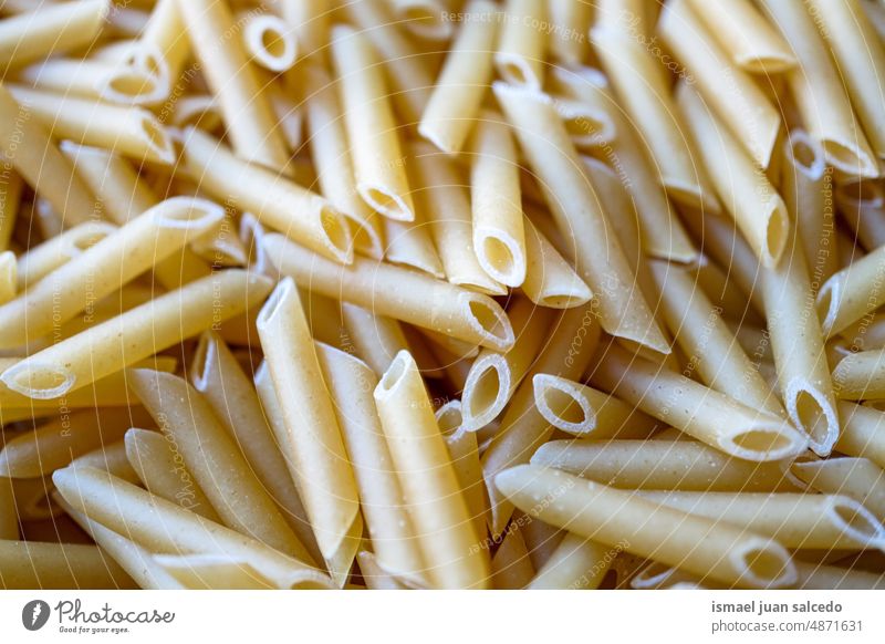 uncooked macaroni pasta, italian food Pasta Food Macaroni Italian penne Raw raw pasta Raw vegetables Component Meal Healthy Cooking Kitchen Dinner Dry Italy