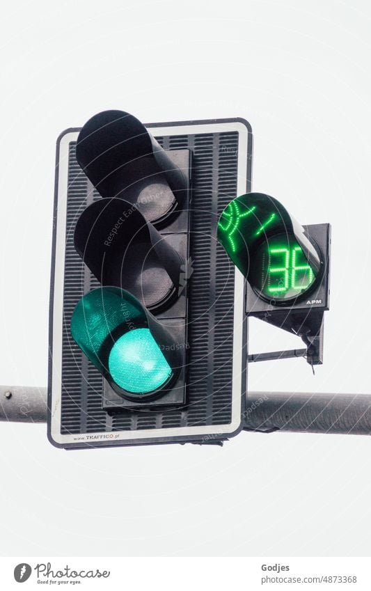 green wave ends in 36 seconds, view of traffic light with time indication how long it is still green, Szczecin Traffic light Green Transport Light Street