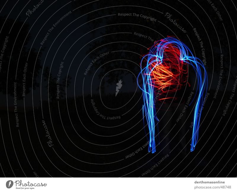 Blue man with heart Man Dark Tracer path Speed Action Muddled Swing Loneliness Stagnating Long exposure Heart Fiddle Strange Bordered Red Night Style Light Joy