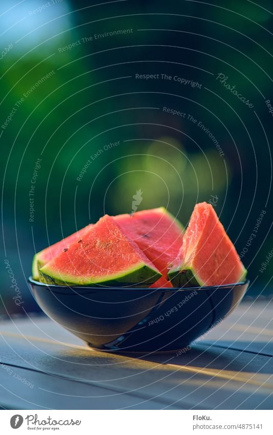 Melons pieces in black peel Derby Water melon slices Food Fruit Delicious Red Colour photo Nutrition Summer Fresh Diet cute Healthy Juicy Vegetarian diet Green