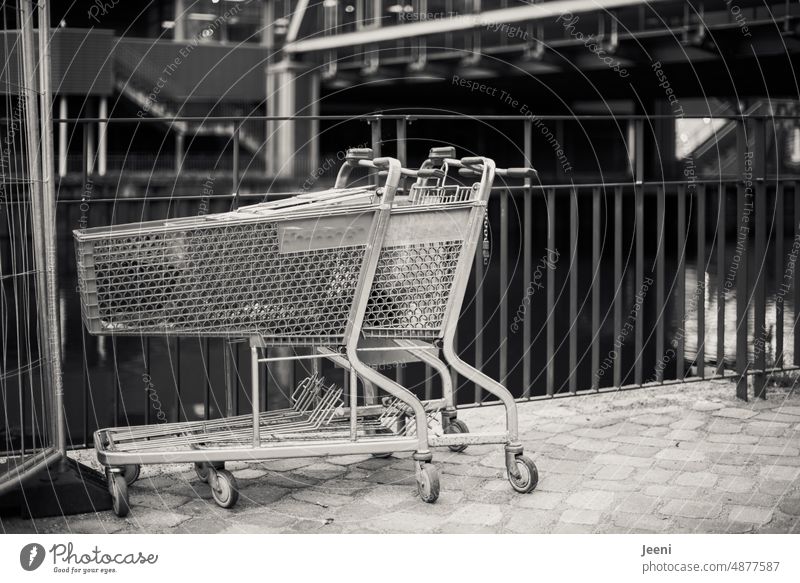 Shopping cart simply left in the city Shopping Trolley Consumption Supermarket Stand Customer Theft Town Shackled ditch sb. Purloin rail turned off consumer