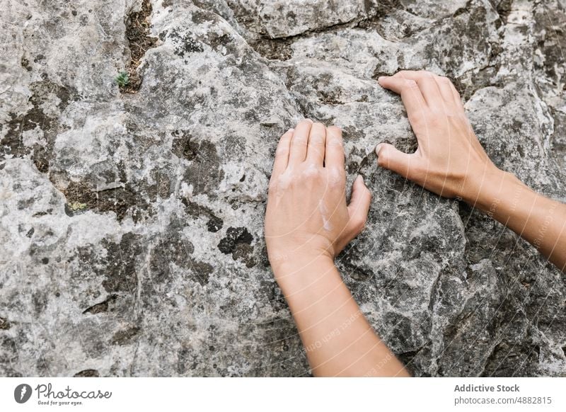 Cropped Hands Gripping On Rock Hiker Cliff Rocky Powder Climber Chalk Sport Climbing Mountaineering Hiking Adventure Activity Exploration Vacation Trekking